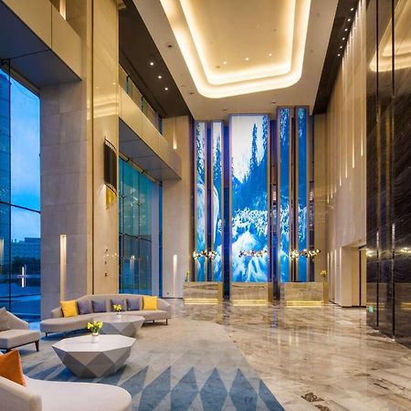 Отель Radisson Ningbo Beilun Экстерьер фото